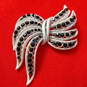 WEISS Vintage Japanned White & Black Rhinestone Bow Brooch